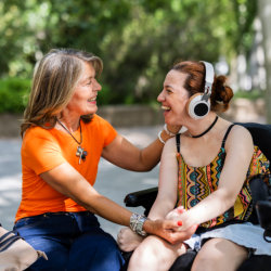 two woman laughing together