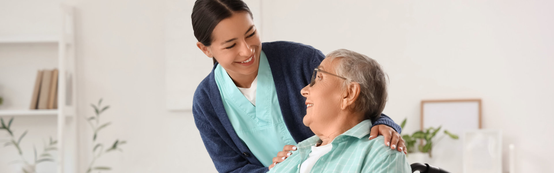 caregiver and elderly woman